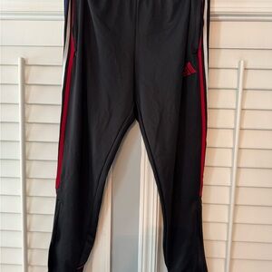 Adidas Black Joggers with Red, White and Blue stripes.